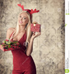 happy-sexy-xmas-girl-christmas-shoot-blonde-dress-long-blonde-hair-funny-reindeer-ears-taking-...jpg