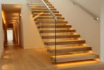 Handmade-stairs-4-caption_Extra-wide-contemporary-staircase-with-open-oak-treads.jpg